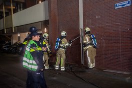 Brand in spouwmuur van appartementencomplex